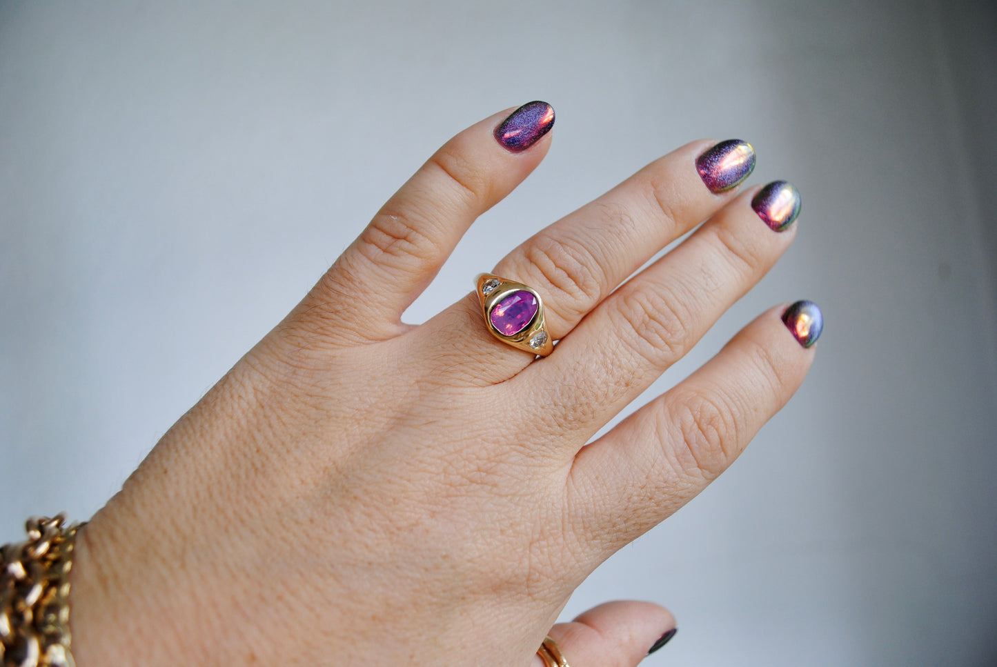 2.04 carat opalescent pink sapphire with antique diamonds