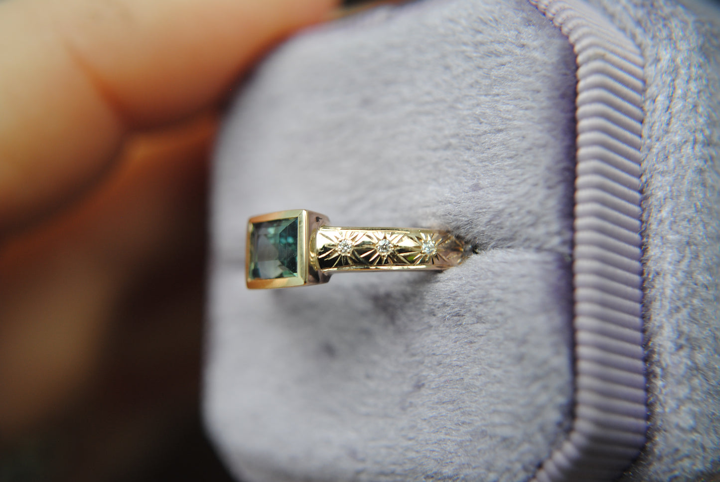 1.1 carat teal baguette sapphire and diamond stars ring