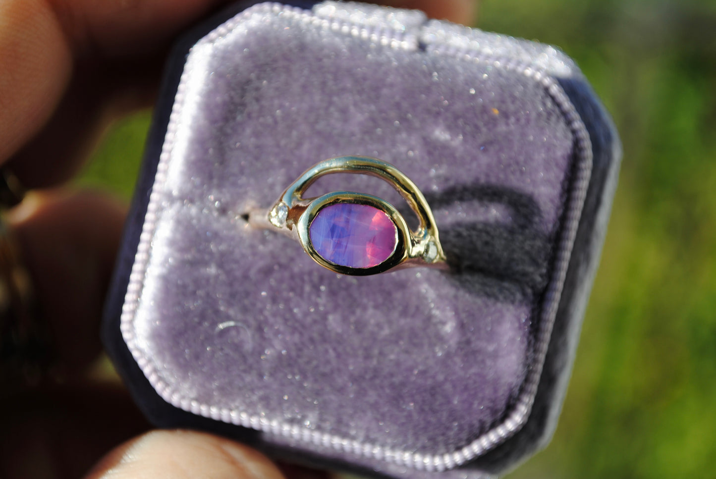 opalescent pink sapphire bowed ring