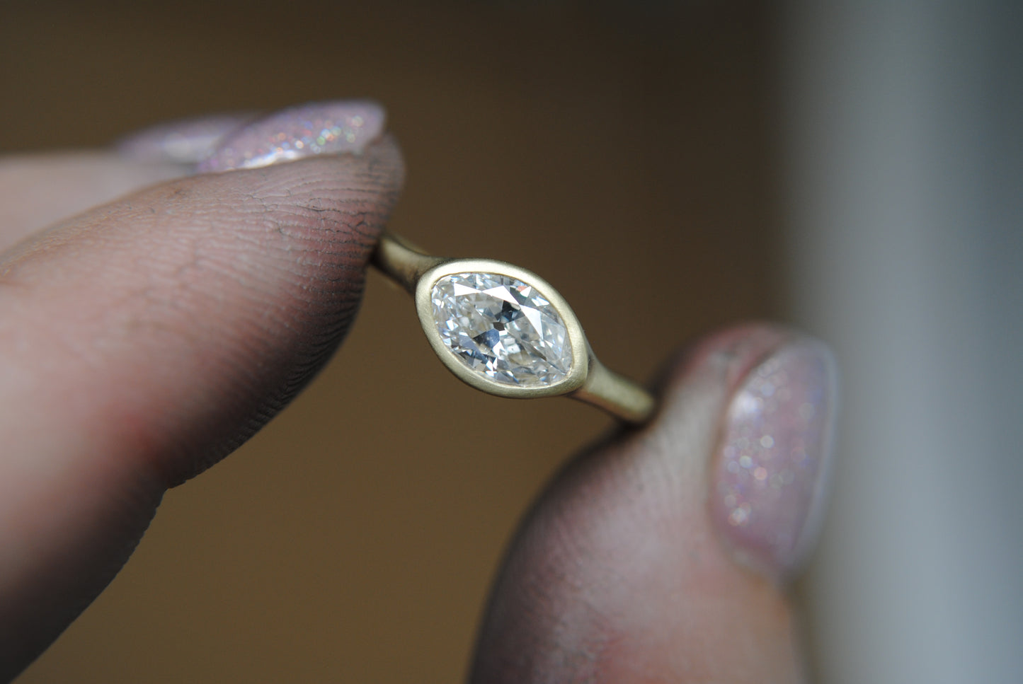 east west moval diamond ring