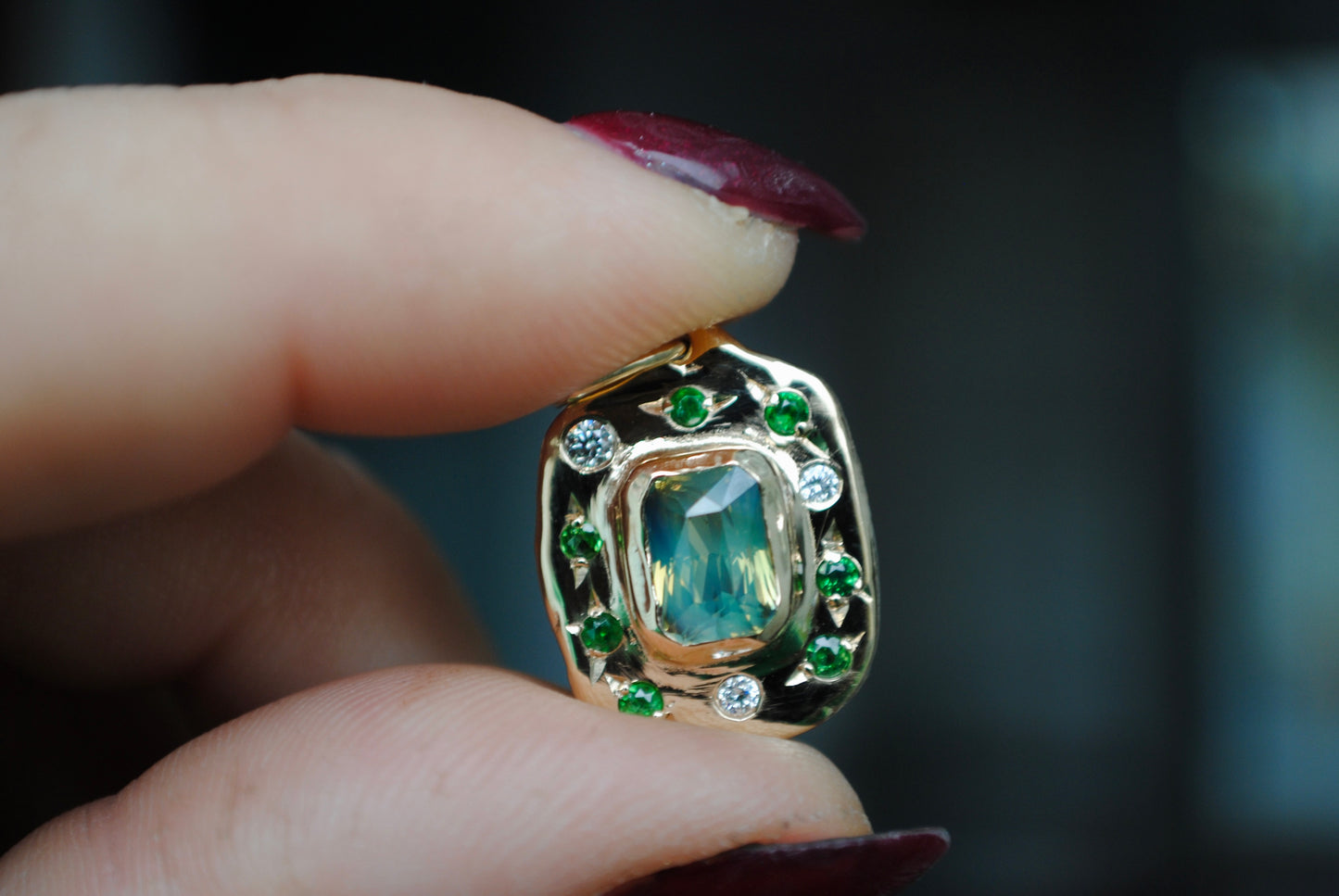 Empress Charm, 1.65 carat radiant cut opalescent sapphire