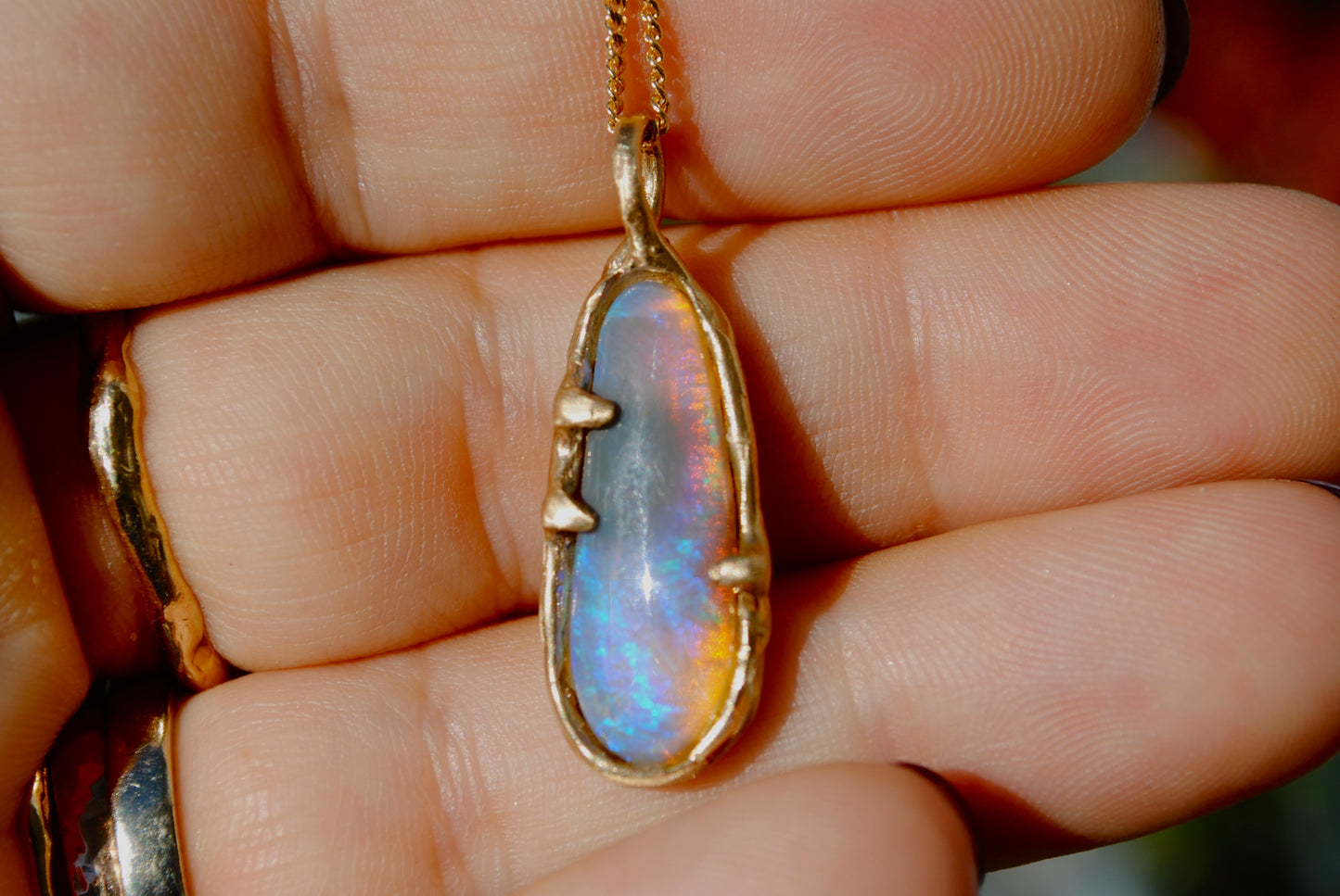 Molten Opal Charm