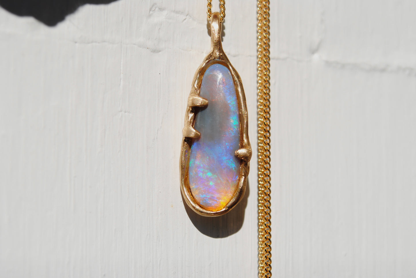 Molten Opal Charm