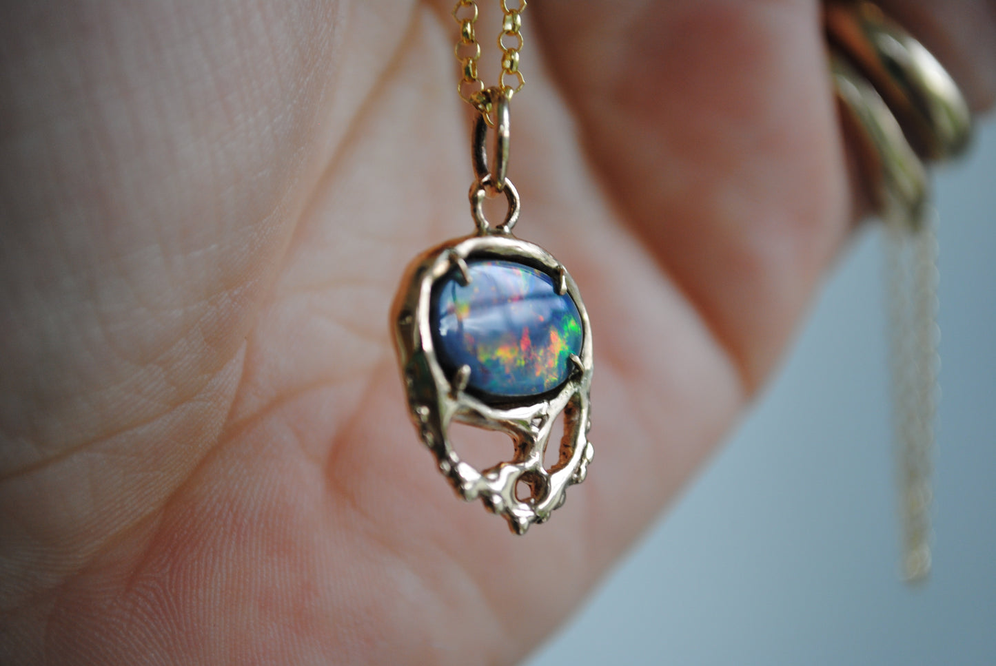 Molten Opal Charm