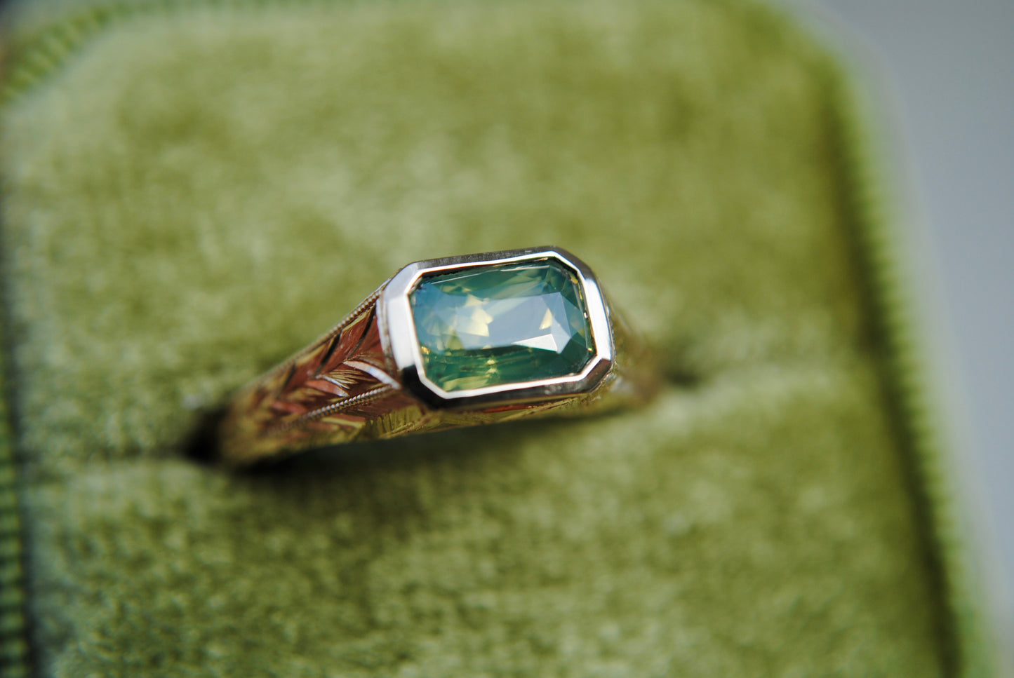 Engraved Siggy, 1.61 carat Opalescent Green Sapphire