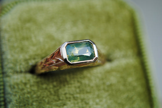 Engraved Siggy, 1.61 carat Opalescent Green Sapphire