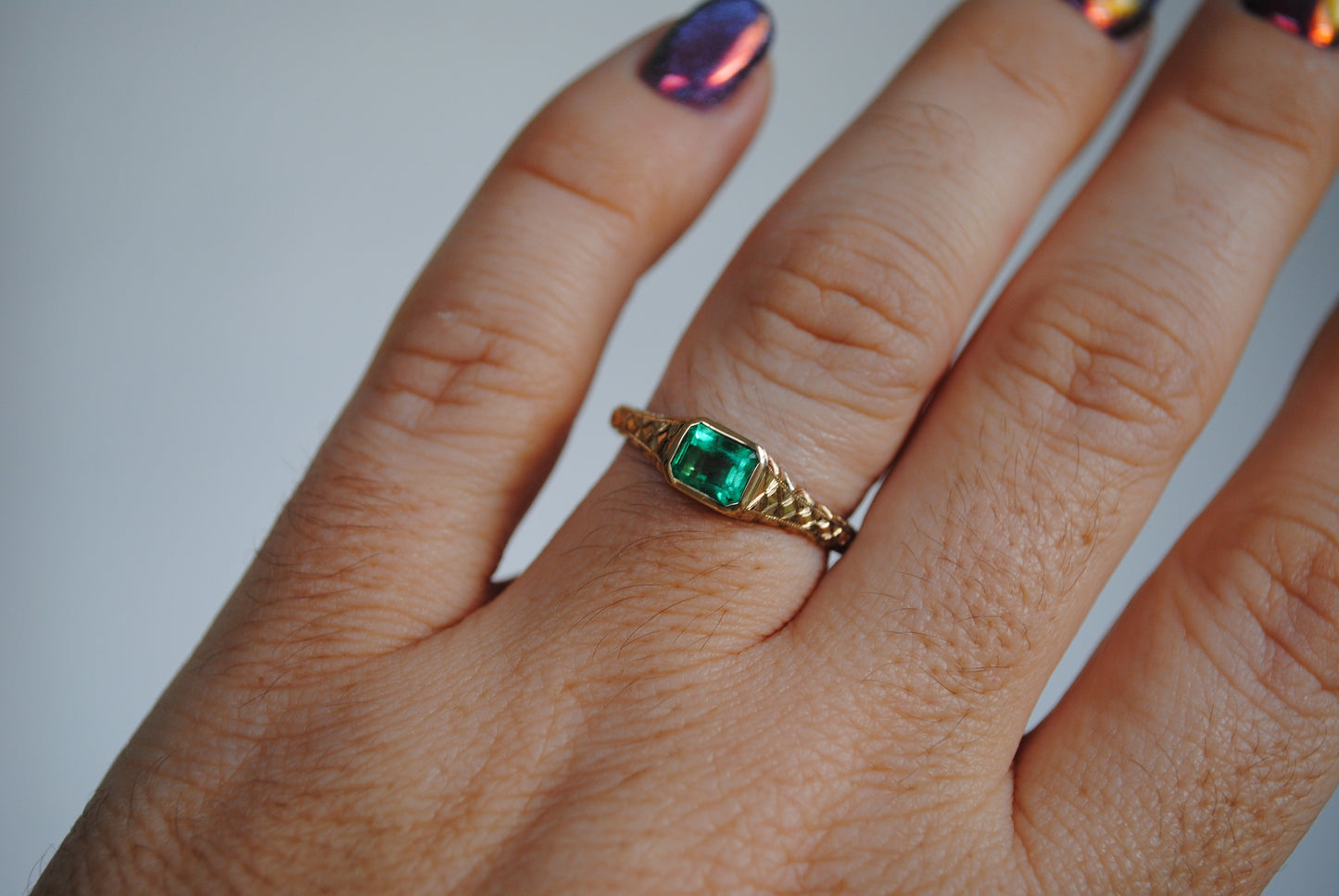 Engraved Siggy, .7 carat natural Emerald