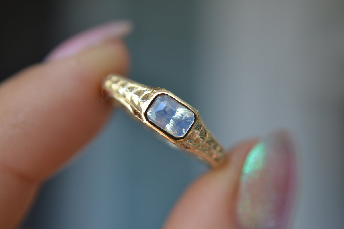 ENGRAVED SIGGY - 1.02 CT MILKY OPALESCENT SAPPHIRE