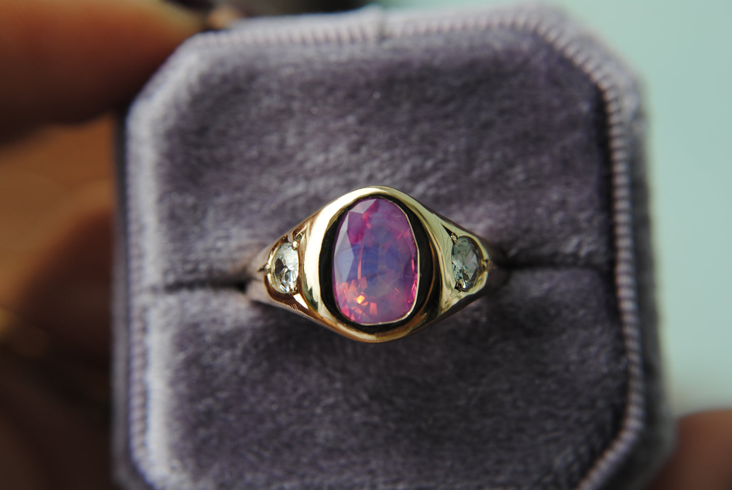 2.04 carat opalescent pink sapphire with antique diamonds