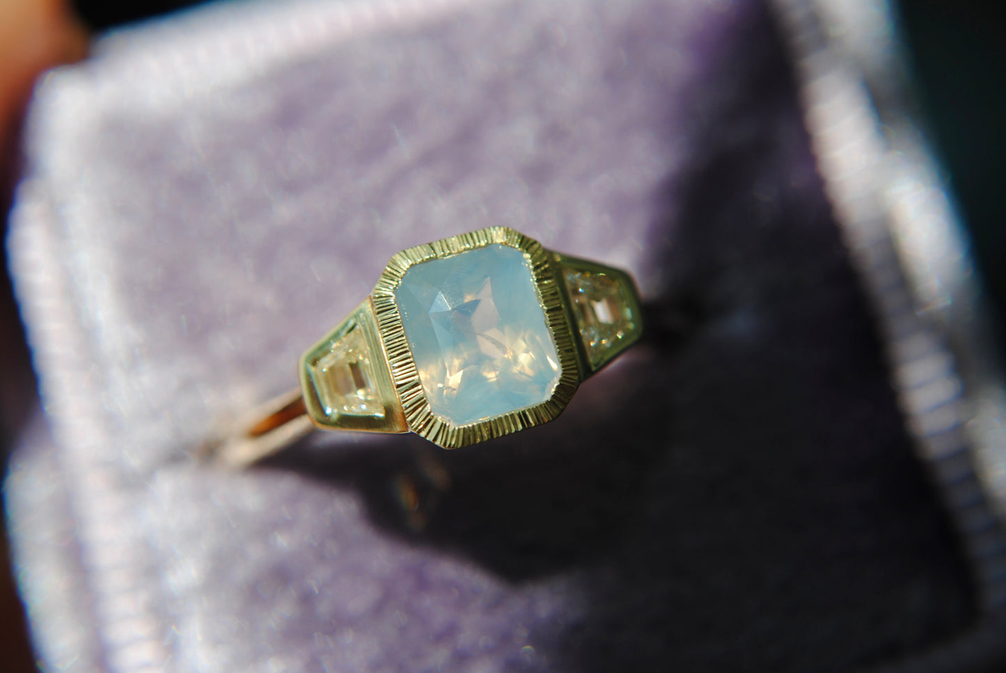 1.11 carat Milky Blue Sapphire + Trapezoid Diamond Ring