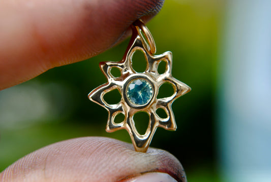 opalescent teal blue green sapphire lucky star charm