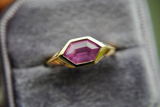 2.05 carat pink hexagon opalescent sapphire engraved signet
