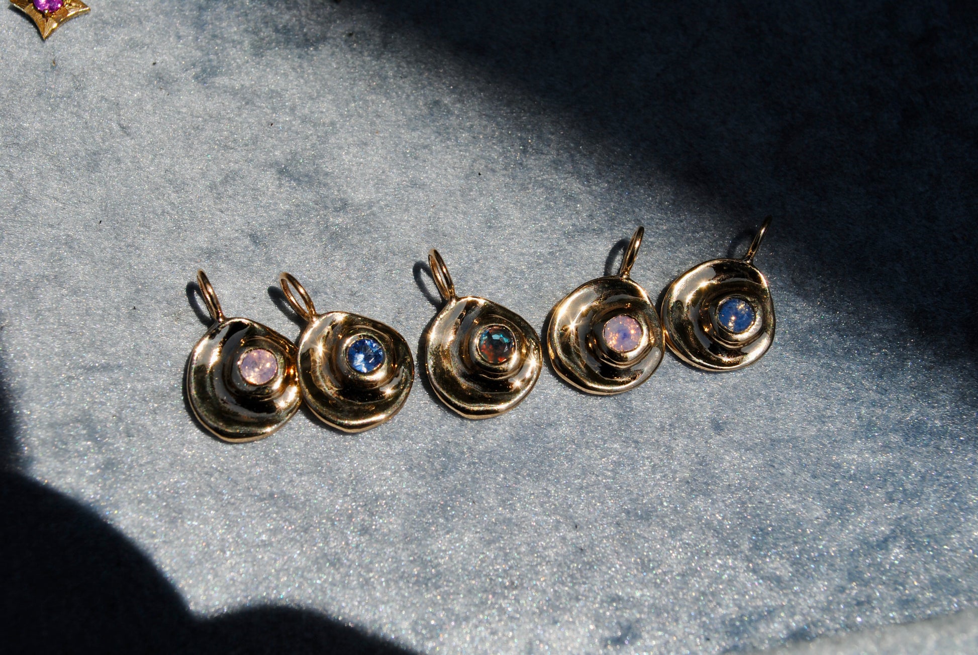 group of charms together on a blue background
